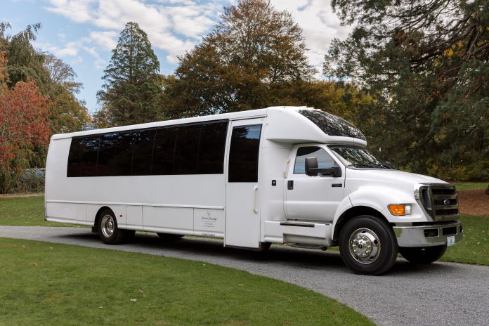bus-mini-coach-28pax-pic blackbuscompany.com charter bus prices